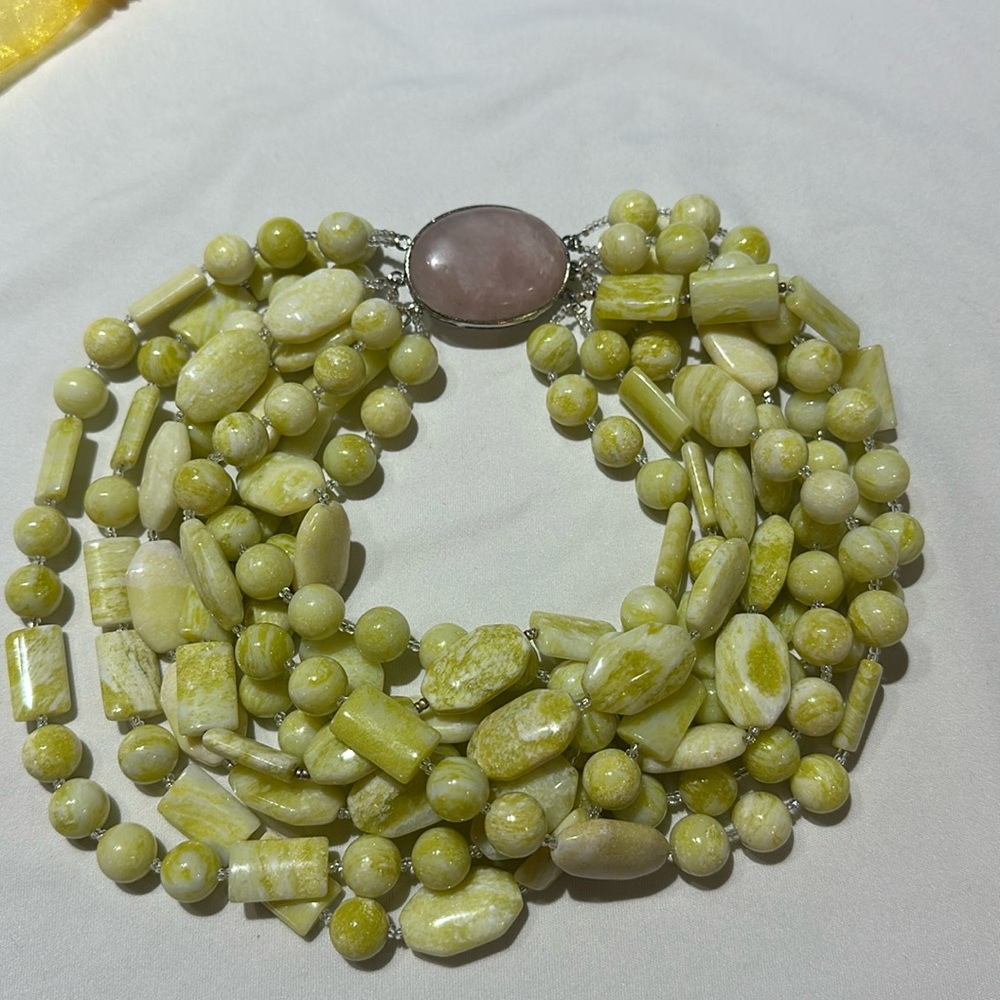 Green and white multi strand bead necklace